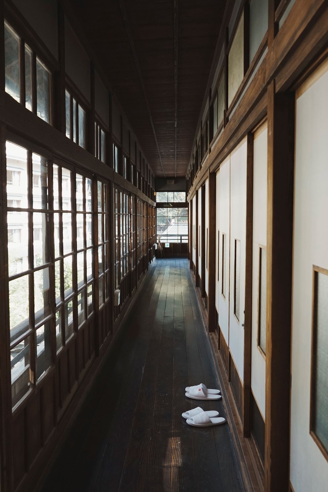 The same passage by morning, daylight pouring through the old glass