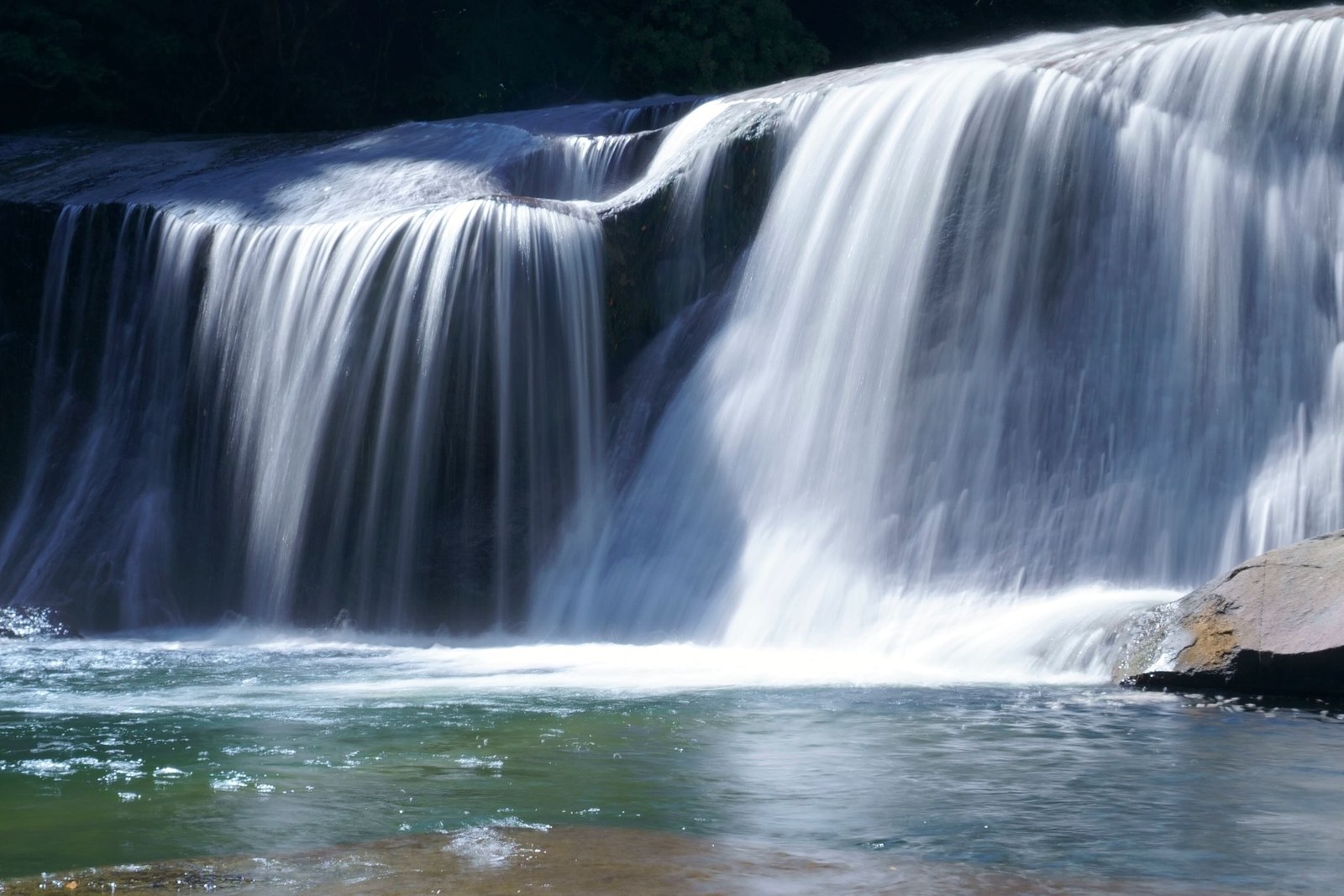 Nametsu Falls, a thirty-meter-wide curtain of water along the old road
