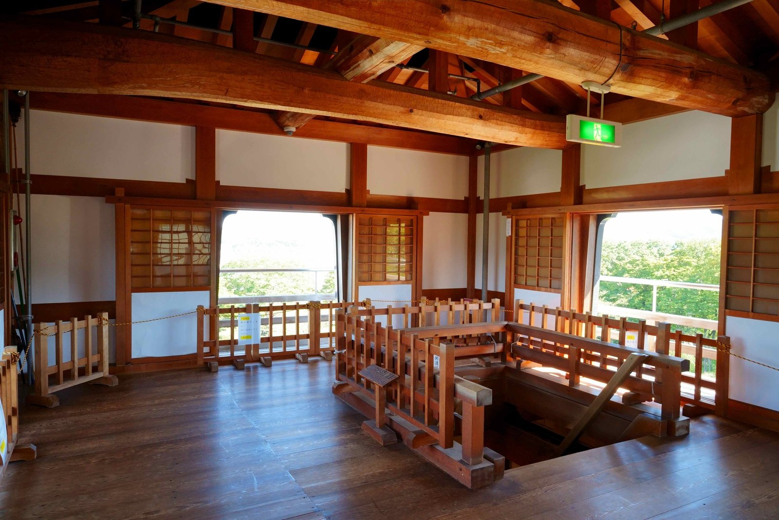 Bare cypress and honest joinery on the upper floor